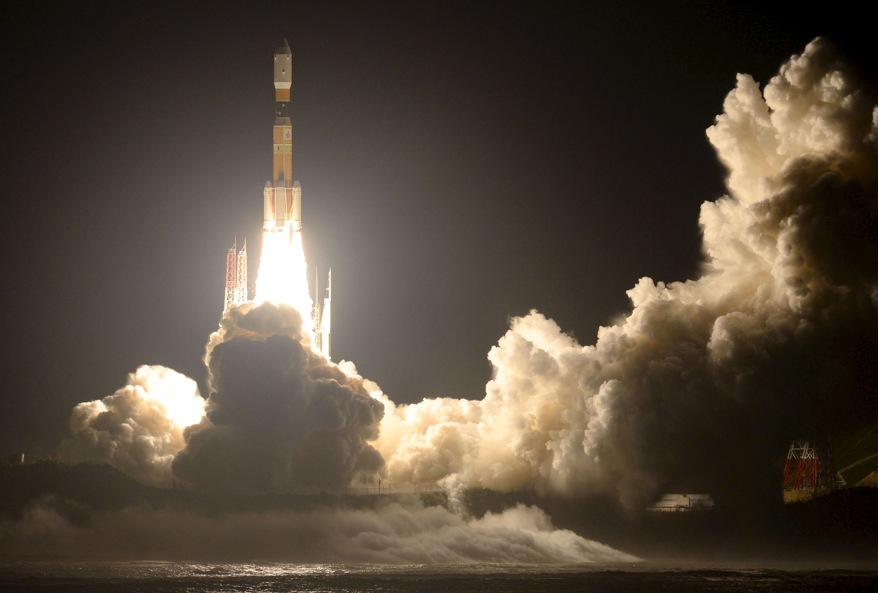 A H-2B rocket carrying cargo craft for the International Space Station (ISS) called "Kounotori No.5" blasts off from the launching pad at Tanegashima Space Center on the Japanese southwestern island of Tanegashima, Kagoshima prefecture, southwestern Japan, in this photo taken by Kyodo August 19, 2015. "Kounotori" which is Japanese for White stork lifted off with supplies for the International Space Station on Wednesday. The unmanned cargo craft is bringing food, hygiene items and spare parts to the ISS.    Mandatory credit REUTERS/Kyodo ATTENTION EDITORS - FOR EDITORIAL USE ONLY. NOT FOR SALE FOR MARKETING OR ADVERTISING CAMPAIGNS. THIS IMAGE HAS BEEN SUPPLIED BY A THIRD PARTY. IT IS DISTRIBUTED, EXACTLY AS RECEIVED BY REUTERS, AS A SERVICE TO CLIENTS. MANDATORY CREDIT. JAPAN OUT. NO COMMERCIAL OR EDITORIAL SALES IN JAPAN.